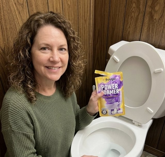 Linda Davis showing opened fuugu Power Foamer sachet in bathroom